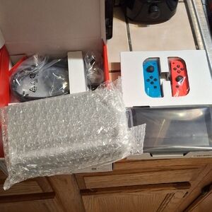 Brand New Nintendo Switch with Red and Blue Joy-Con Controllers!